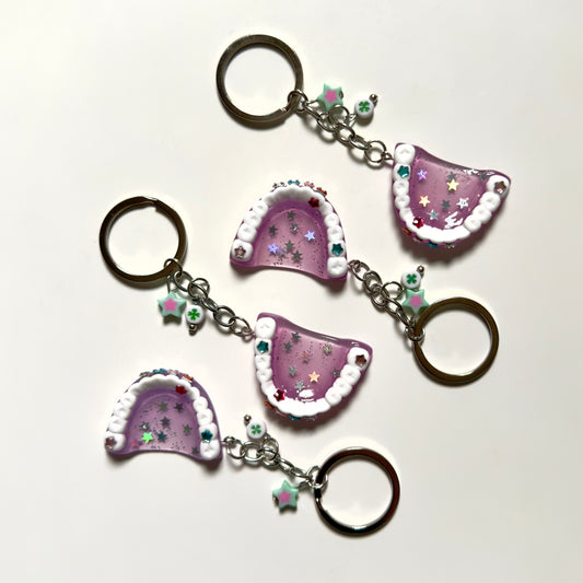 مدالية طقم اسنان